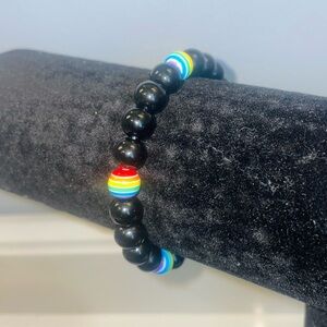 Handmade rainbow and black glass bead bracelet